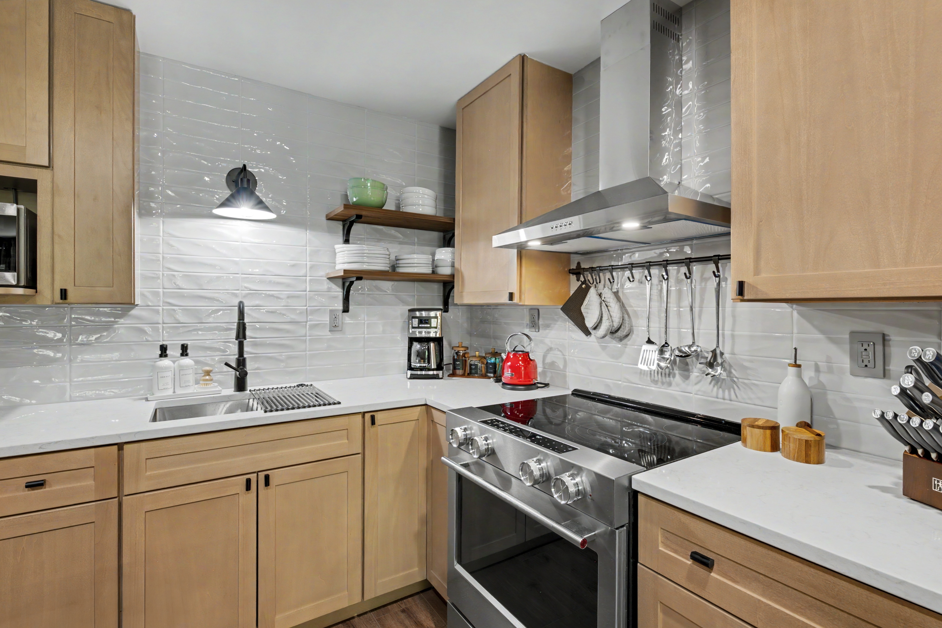 Kitchen close-up with range and open shelving