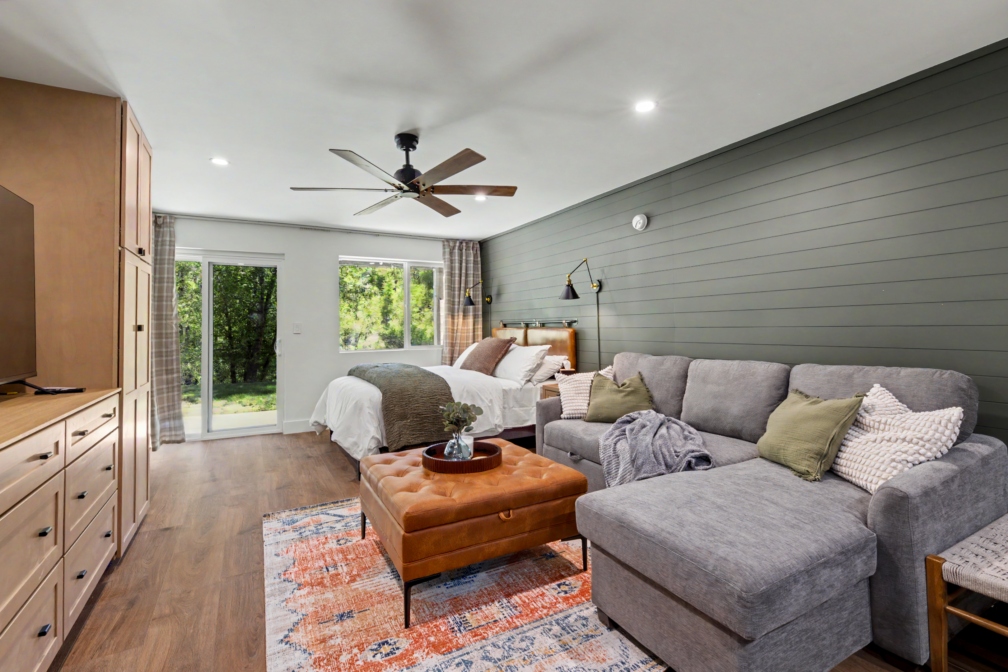 Studio interior with bed and seating area