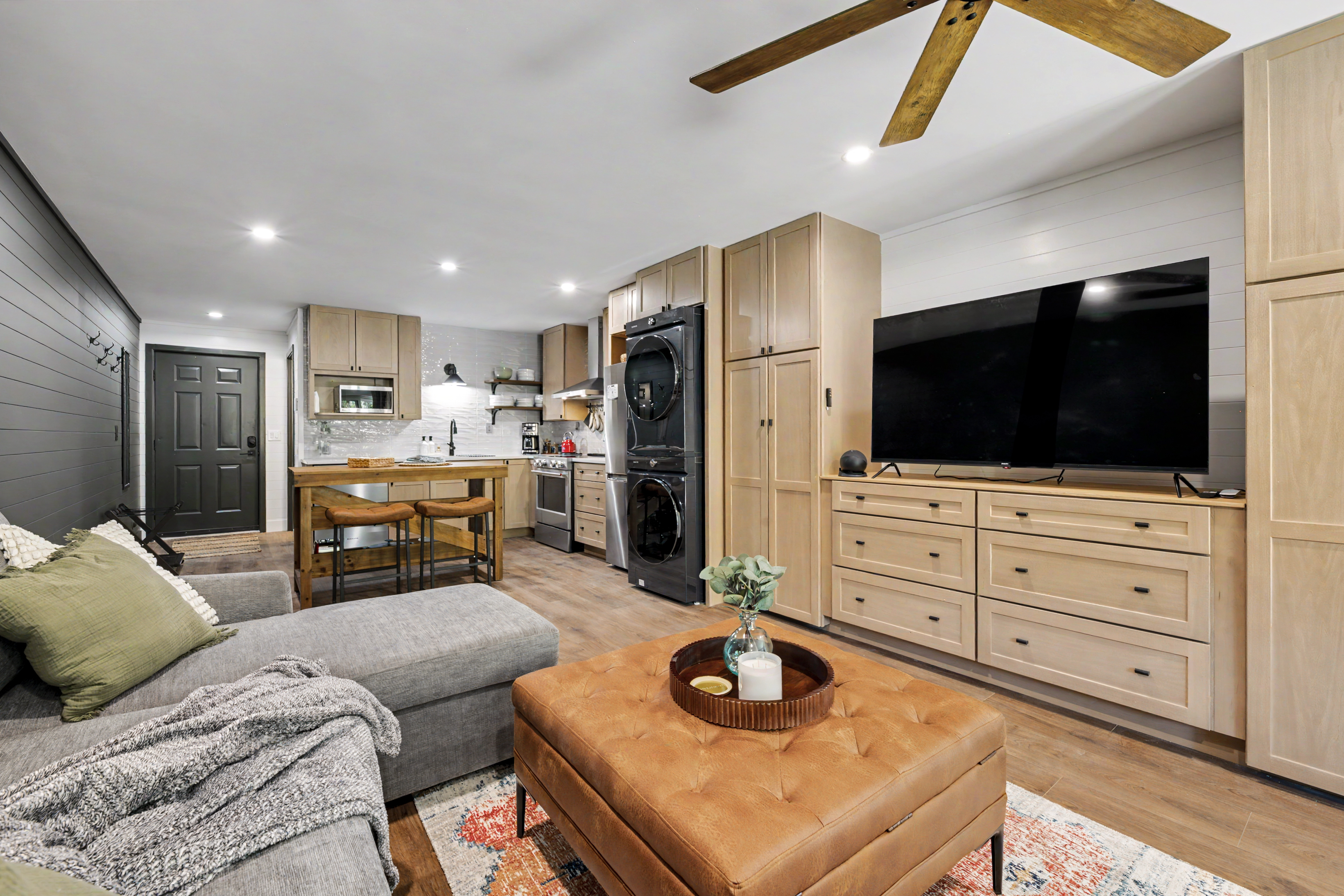 Living area with TV and kitchen